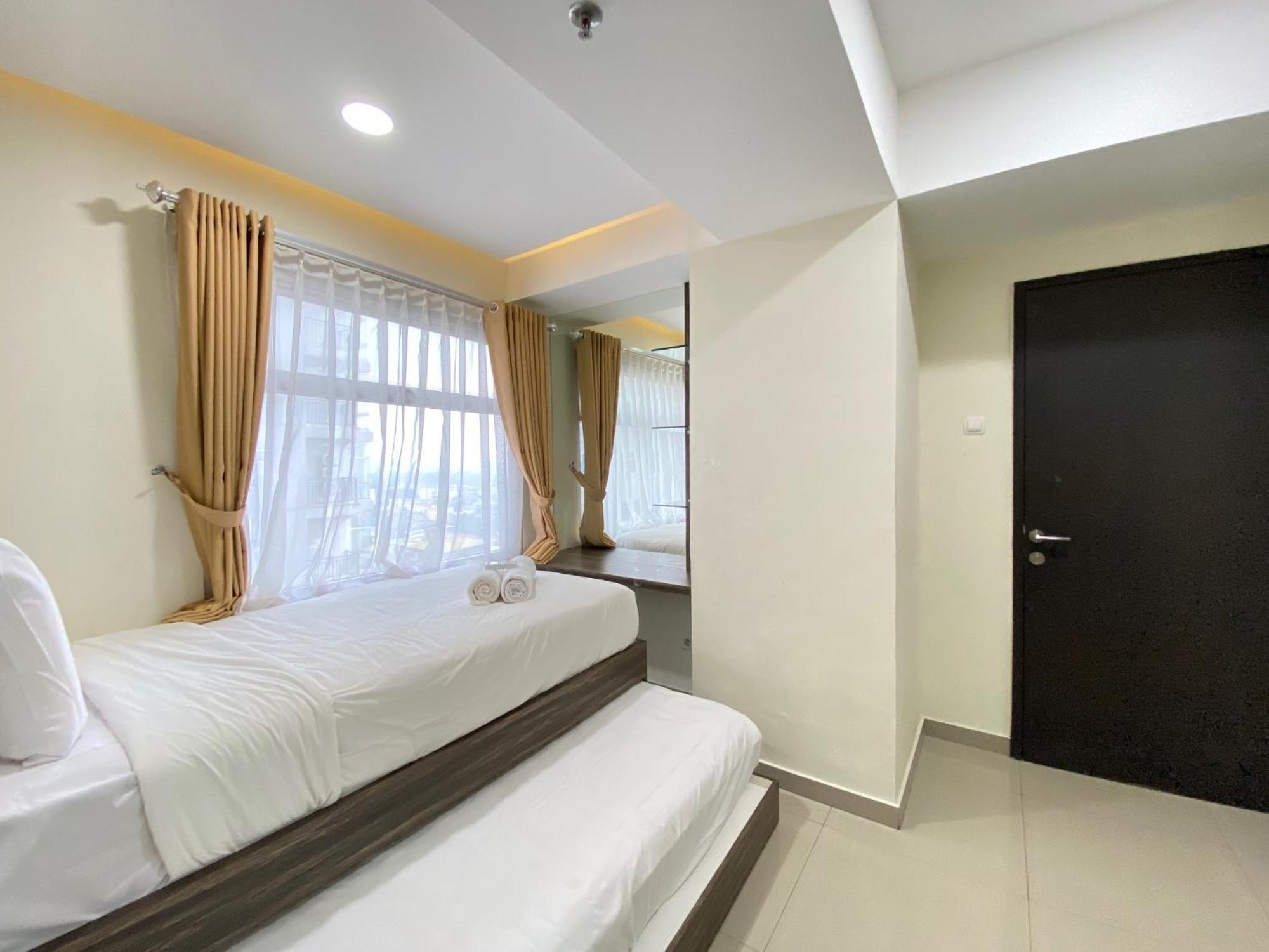 Apartemen Comfy 3br At Grand Afrika By Travelio