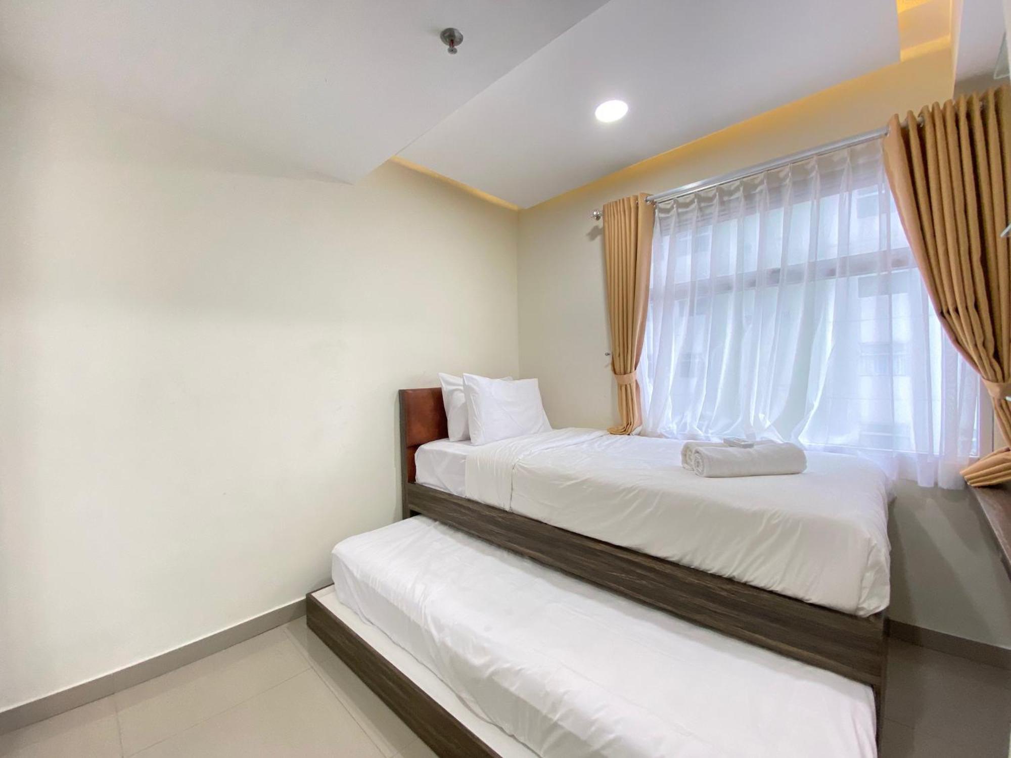 Apartemen Comfy 3br At Grand Afrika By Travelio